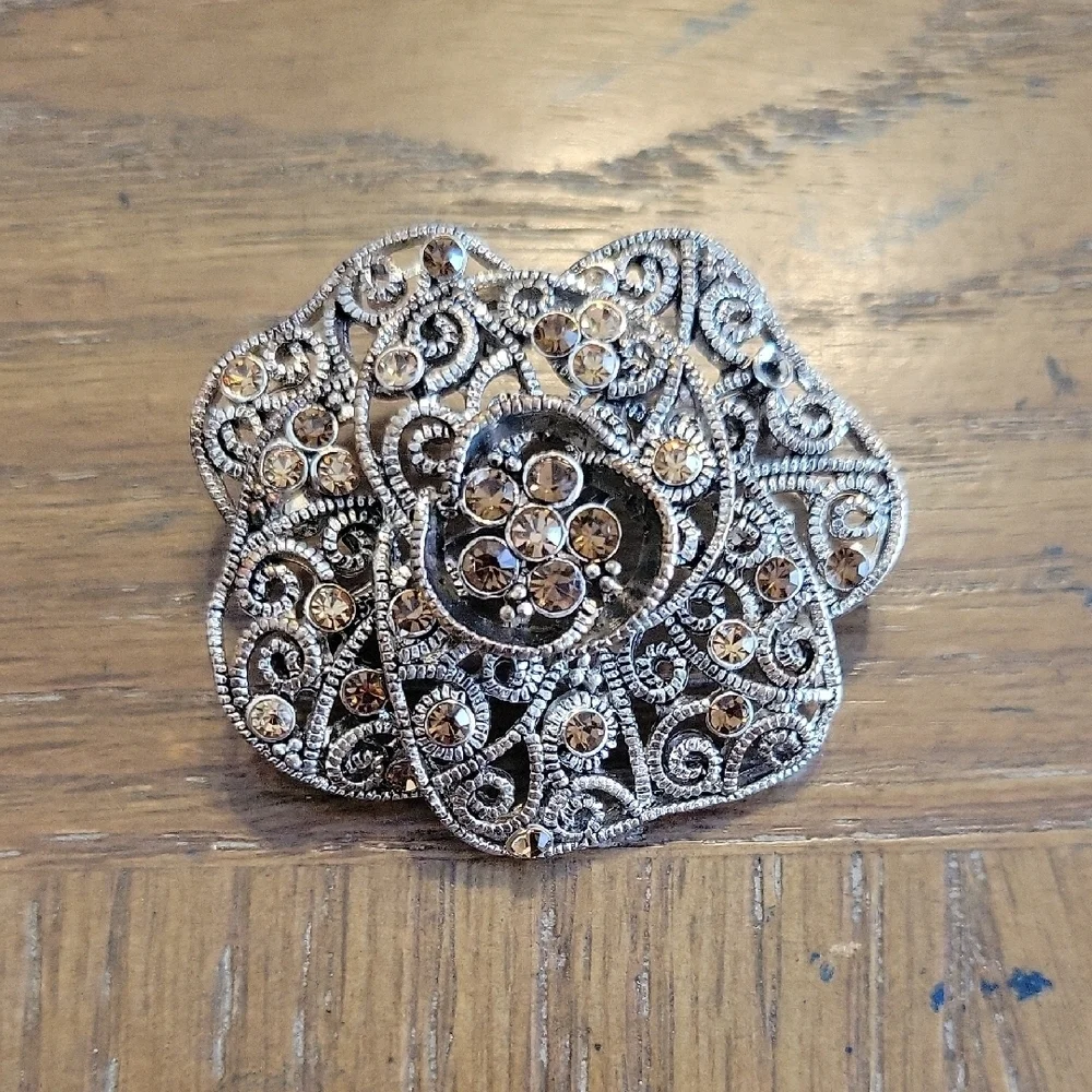 Elegant Silver and Gold tones Floral Brooch with chocolate chrystals